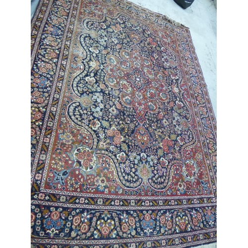 341 - Large Persian type carpet mostly red and blue wools Approx 13' x 9.5'