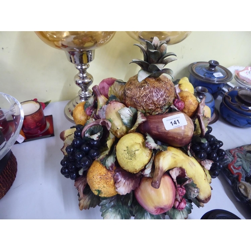 262 - Pottery faux fruit in bowl