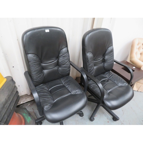 20 - Pair of black faux leather office chairs