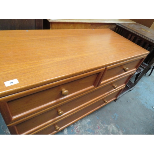 49 - Bedroom chest of two long and two short drawers with knob handles