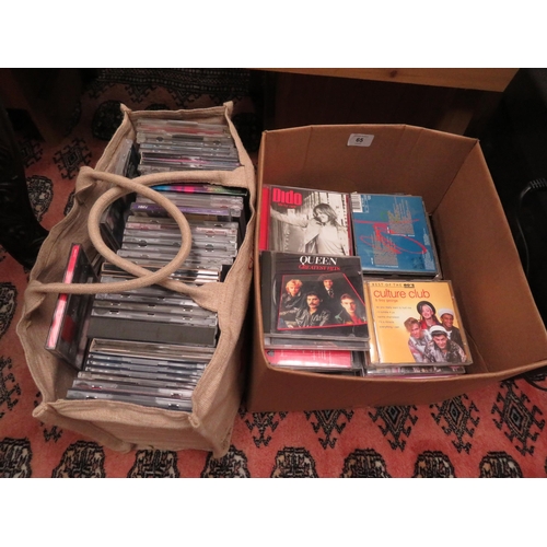 65 - A bag and a box of CDs