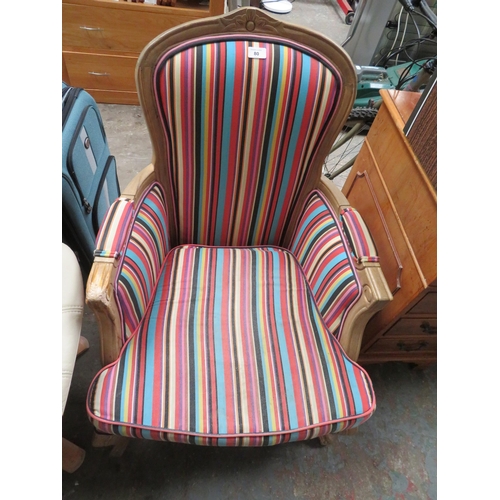 80 - Armchair in striped upholstery