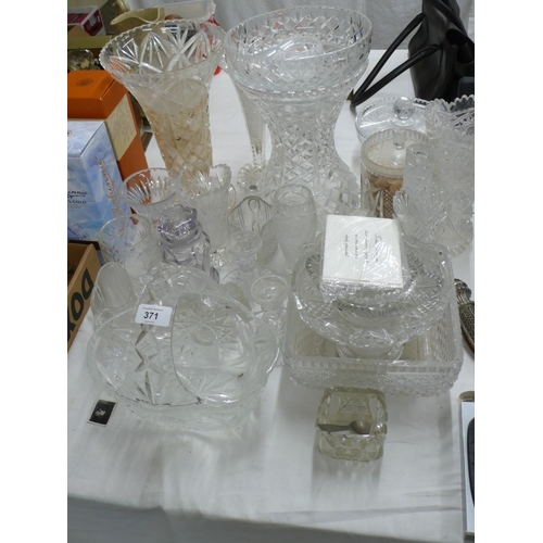 A large collection of cut glass vases bowls etc