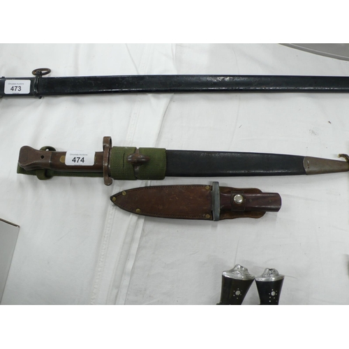 474 - British bayonet and leather scabbard together with  a leather sheathed knife