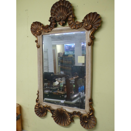 299 - Large gilt framed mirror with shell decoration to top and bottom total size - Approx 5ft X 3ft