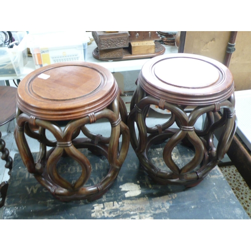 322 - Pair of Chinese hardwood barrel shaped pots stands with carved bamboo decoration