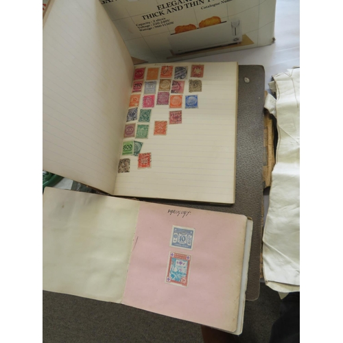 38 - Three stamp albums