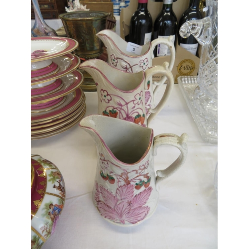 5 - Three graduated Sunderland lustre jugs