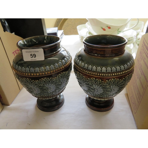 59 - A pair of Doulton Lambeth vases marked 1884 to base - ht. 7 ins approx.