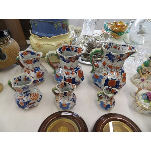 235 - A set of six Mason's Ironstone graduated jugs in the Imari pattern