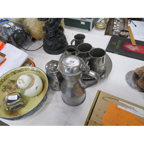 288 - A collection of old pewter items tankards, dishes etc