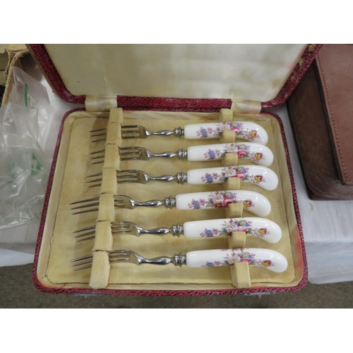 297 - Cased set of Royal Crown Derby cake forks