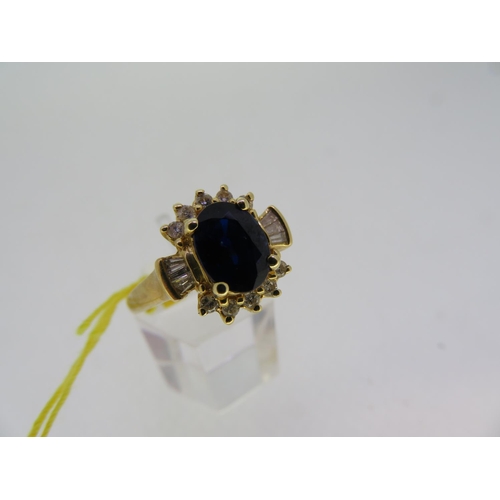 201 - 14 ct. gold sapphire and diamond ring - size P