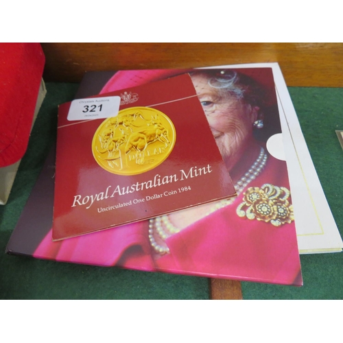 321 - A collection of Presentation coins - Memorial crown, God Save the Queen and Australian Dollar