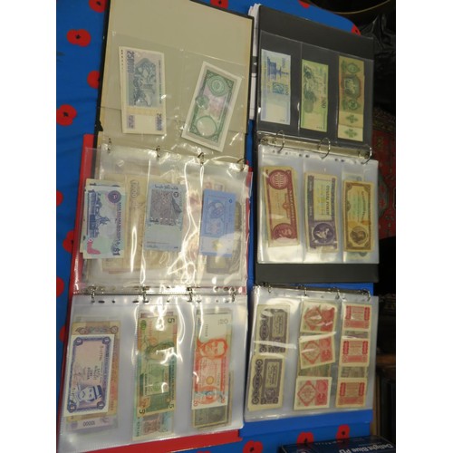 250 - Four albums of worldwide bank notes