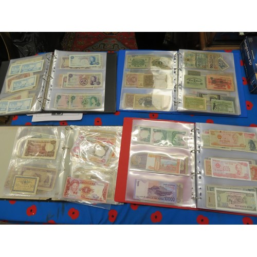 250 - Four albums of worldwide bank notes