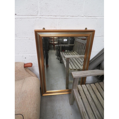 122 - Large bevel edged glass mirror in fancy frame