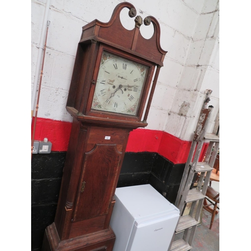 16 - Long case clock by Jones? with patterned dial