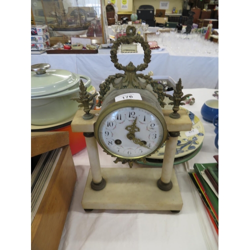 176 - Mantel clock with enameled dial brass and alabaster striking on a bell