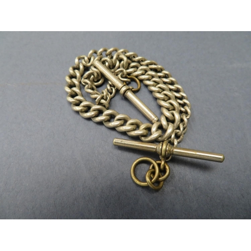 86 - A silver watch chain and T bars