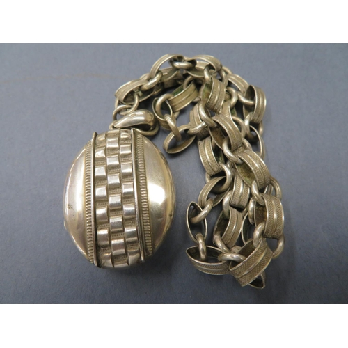 87 - 19th/20thC silver locket and chain