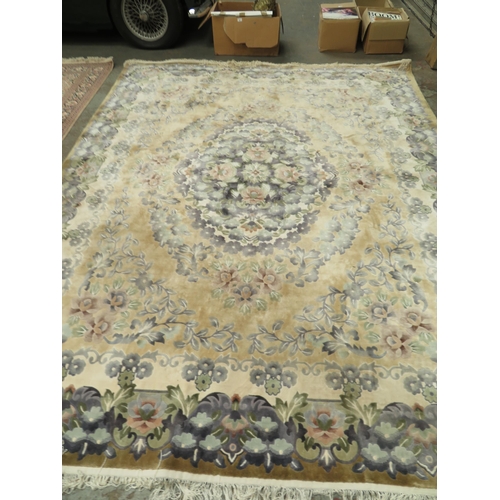 51 - Good quality carpet with floral designs in mostly cream and blue wools 128