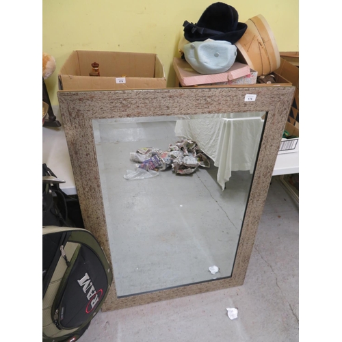 176 - Bevel edge glass wall mirror in silvered frame