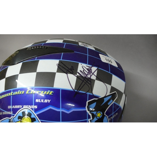 245 - An unused motorcycle helmet signed by John McGuiness