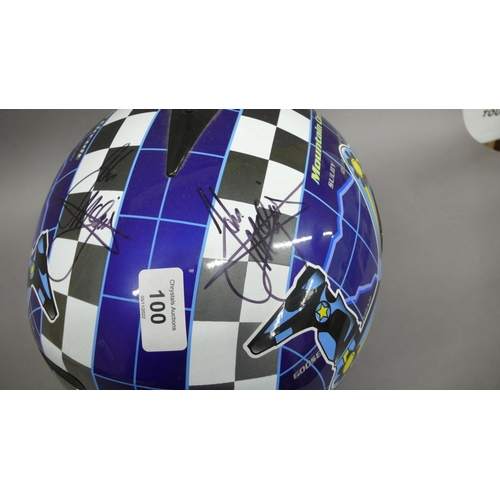 245 - An unused motorcycle helmet signed by John McGuiness