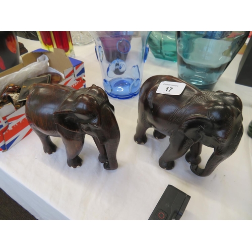 17 - Two carved rosewood elephants - ht. 6 ins