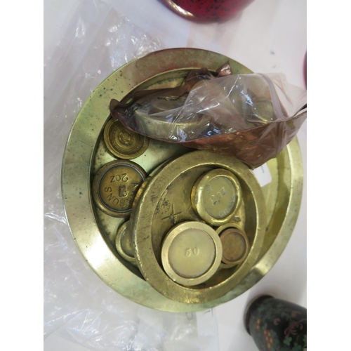 28 - A collection of brass weights including a large 400 rupees weight made by William Brown & Co London