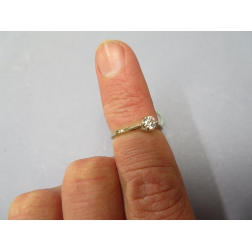 54 - An 18 ct. gold .25 carat diamond ring - size K