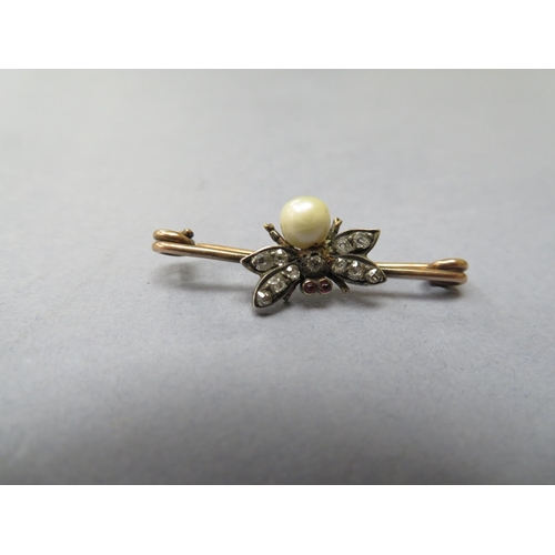 77 - A gold, diamond, ruby, and pearl Bee brooch