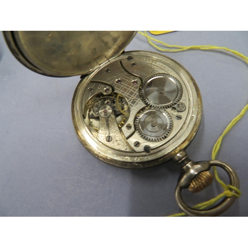 87 - A Swiss silver cased top winding pocket watch (ticking)