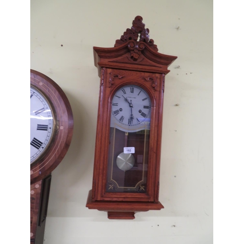 182 - Modern oak cased wall clock