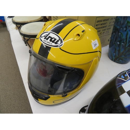 244 - A Joey Dunlop ARAI helmet with dust bag