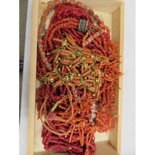 261 - A box containing old coral and other jewellery