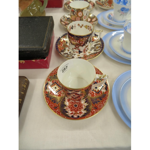 287 - Six Royal Crown Derby different Imari pattern coffee cans and saucers