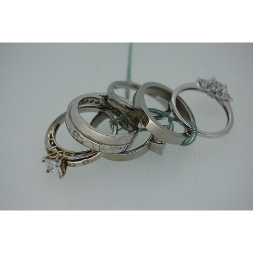 348 - Six white stone and white metal rings