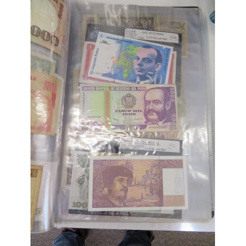 32 - A folder full of numerous world wide bank notes