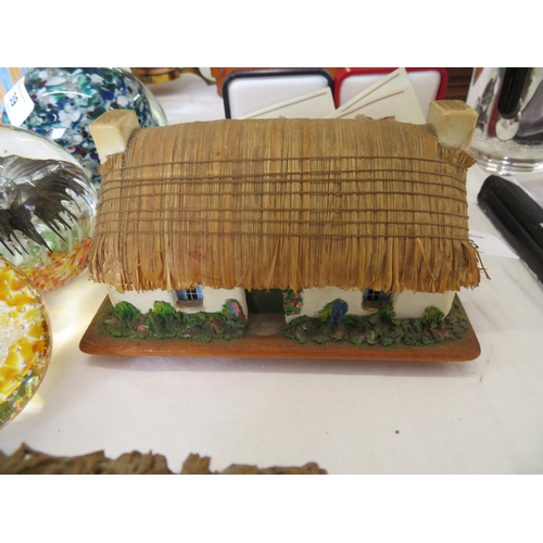 36 - Manx musical thatched cottage