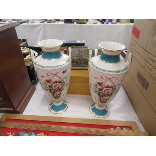 209 - Pair of Minton rose basket pattern porcelain urns