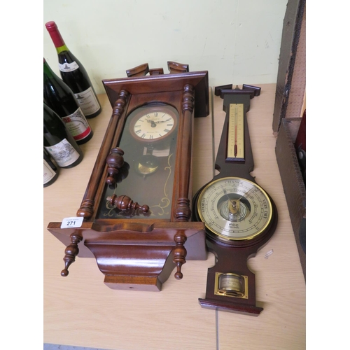 271 - Wall clock and a barometer thermometer