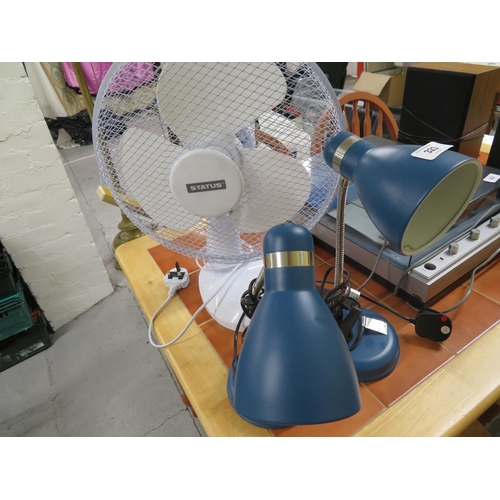 323 - Two blue desk lamps and a fan