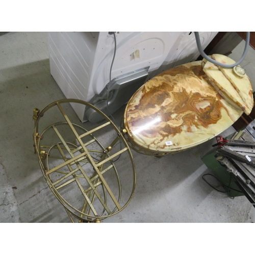 324 - Brass and onyx topped coffee table and a nest of matching tables