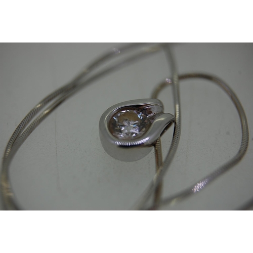 240 - 14ct white gold chain and 18ct white gold and diamond pendant, approx 3/4 carat diamond