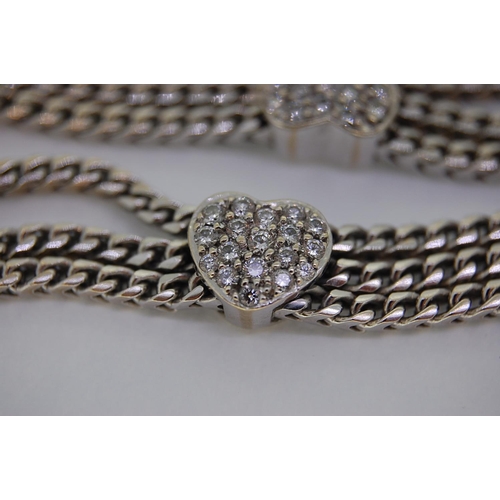 241 - 18ct white gold and diamond bracelet marked CD, total weight 27.8 grams