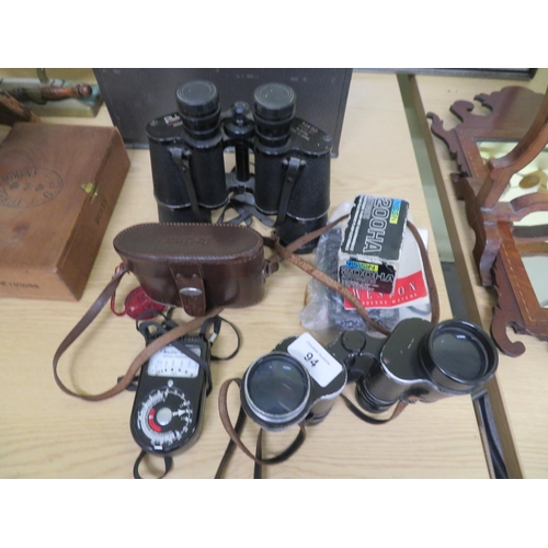 94 - Two pairs of binoculars, plus a camera in case etc