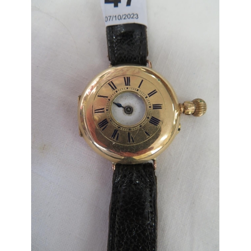 47 - 9ct gold half hunter wristwatch, ticking