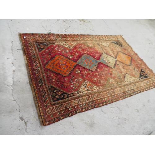 439 - Caucasian carpet with geometric designs, mostly red and blue wools, 104x66ins